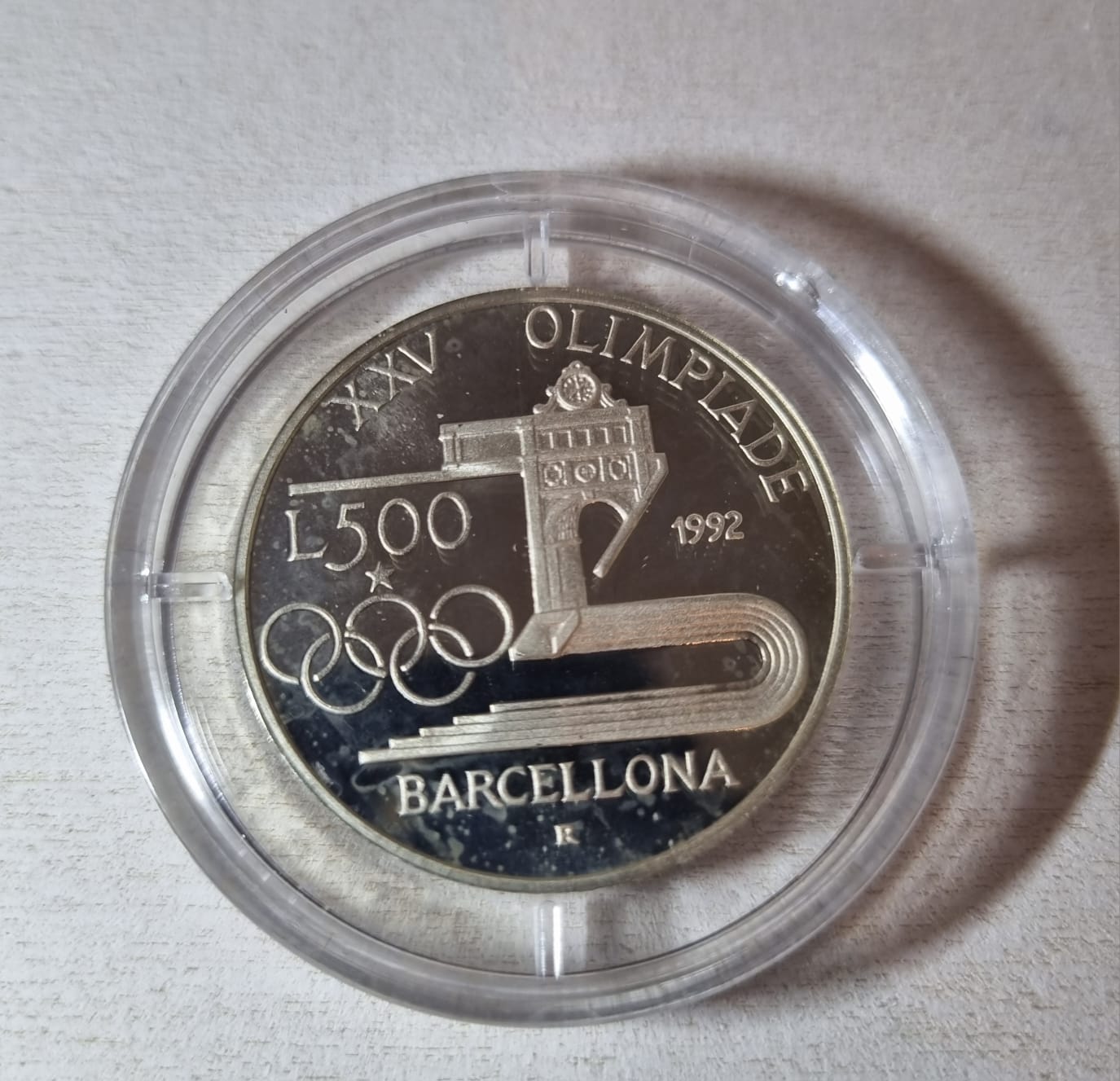 Moneta Commemorativa XXV Olimpiade Barcellona 1992 - Proof Fondo Specchio | Rarexis